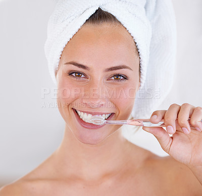 Buy stock photo Close up of a pretty lady brushing her teeth