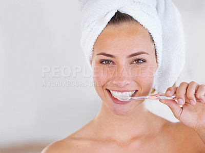 Buy stock photo Close up of a pretty lady brushing her teeth