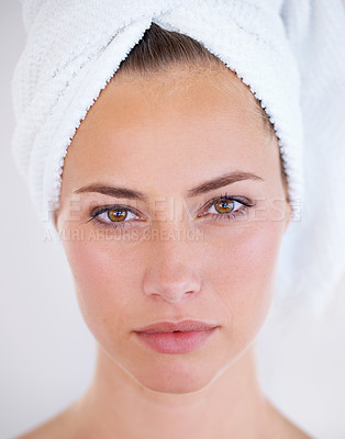 Buy stock photo Head and shoulders view of stunning a stunning woman wearing a towel on her head