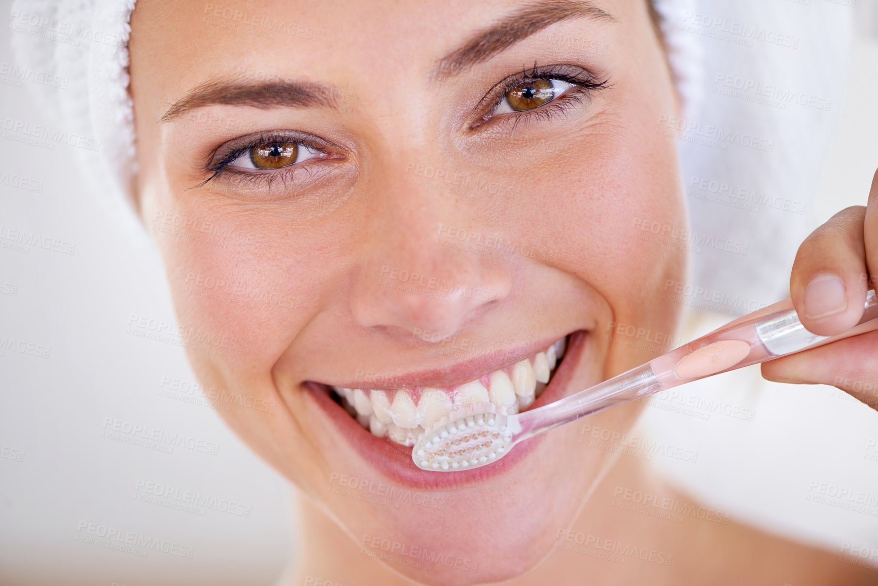 Buy stock photo Portrait of a stunning woman brushing her teeth