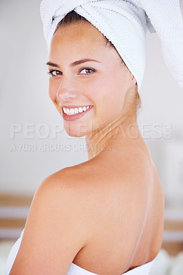 Buy stock photo Portrait, beauty and skincare of happy woman in bathroom for wellness at home. Face, towel and natural cosmetics of young female person with spa facial treatment, dermatology or glow for healthy body