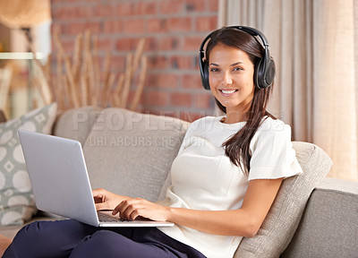 Buy stock photo Headphones, laptop and portrait of a woman student on home sofa listening to music or streaming online. Happy female person smile, relax and learn new language with internet connection and tech