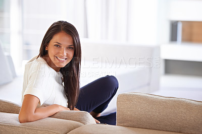 Buy stock photo Portrait, happy and relax with woman on sofa in living room of home for free time, leisure or weekend. Smile, break and resting with young person chilling alone on comfortable couch in apartment