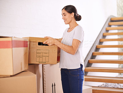 Buy stock photo Boxes, moving and woman in home for real estate, property investment and mortgage of new apartment. Homeowner, happy and female person with cardboard package for growth, relocation or renovation.