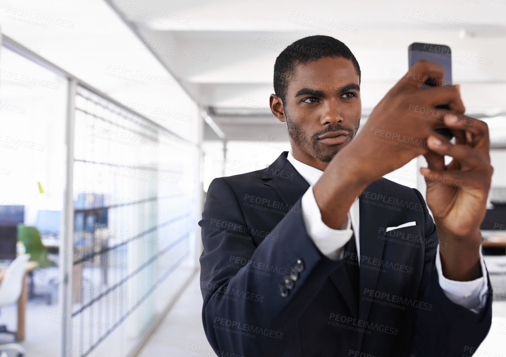 Buy stock photo Businessman, selfie and smartphone with serious face for memory of job interview, social media or new profile picture. Man, work and photo with confidence for career, business or startup in office