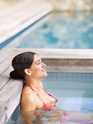 Buy stock photo Woman, happiness and relax in jacuzzi at spa with thinking, vacation or holiday fun in summer with bikini. Tourist, person and face with smile in pool for swimming, hydrotherapy and wellness at hotel
