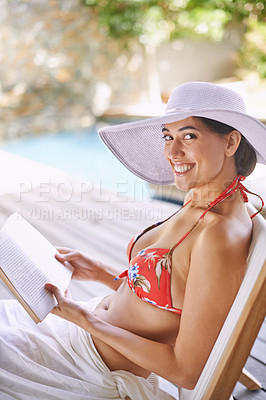 Buy stock photo Woman, bikini and smile for portrait, book and hat at resort in Dubai by swimming pool. Female person, holiday and happy in summer, beauty and outdoor for wellness and relaxation in travel trip