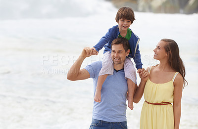 Buy stock photo Family, summer and walking outdoor at beach for travel holiday with a smile and fun. A man, woman and child or son on shoulders while playing together on vacation at sea with happiness, love and care