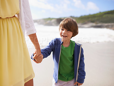 Buy stock photo Walking, kid and mother on the beach holding hands in summer, holiday or vacation with happiness in Florida. Happy, child and mom relax on sand together at ocean or sea for adventure in Miami