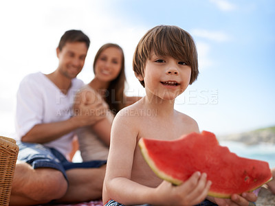 Buy stock photo Portrait, parents and kid on beach with watermelon, picnic and tropical holiday in Australia. Mother, father and happy face of boy child relax at ocean with sunshine, eating fruit and smile in summer