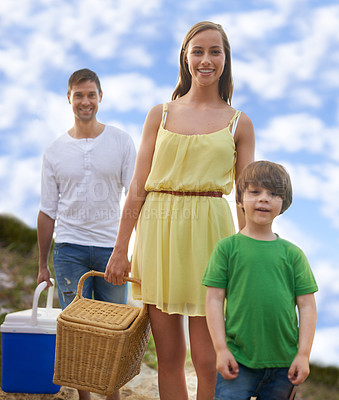Buy stock photo Portrait, picnic and happy family on beach for holiday, adventure and tropical vacation in Australia. Mother, father and face of boy child relax at ocean with sunshine, weekend and smile in summer.