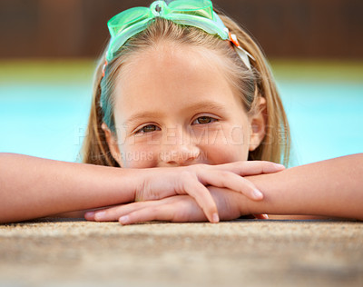 Buy stock photo Girl, relax and portrait of kid in swimming pool with goggles for games outdoor on holiday or vacation. Calm, child and rest on hands, balance on side and happy in water at resort or house in summer