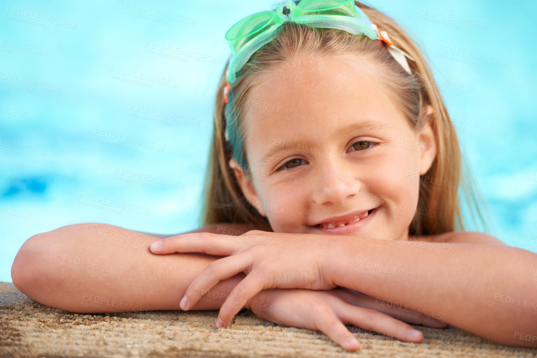 Buy stock photo Girl, relax and portrait of child in swimming pool with goggles for games outdoor on holiday or vacation. Kid, smile and rest on hands at poolside and happy in water at resort or house in summer