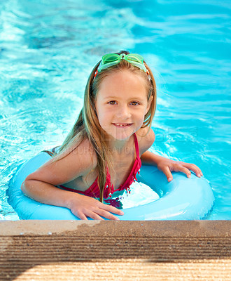 Buy stock photo Happy, portrait and kid with inflatable in swimming pool, games or learning with support in water on vacation. Holiday, activity or girl relax at resort with toys in summer or child with fashion