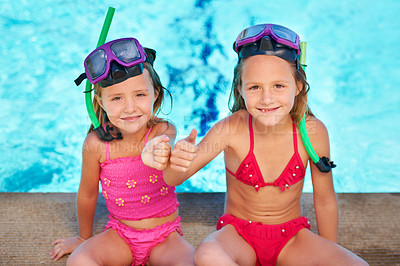 Buy stock photo Portrait, girls and happy children with thumbs up at swimming pool, sisters or siblings outdoor together to relax in summer. Smile, kids and like by water for vacation, holiday and family in swimsuit