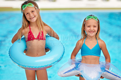 Buy stock photo Summer, inflatables and portrait of kids at swimming pool, ready for adventure on vacation. Holiday, games and friends relax together with toys for fun, activity or children with safety gear in water