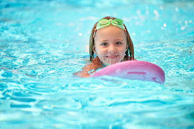 Buy stock photo A little girl in the swimming pool