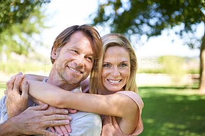Buy stock photo Portrait of an affectionate mature couple  enjoying a day in the park