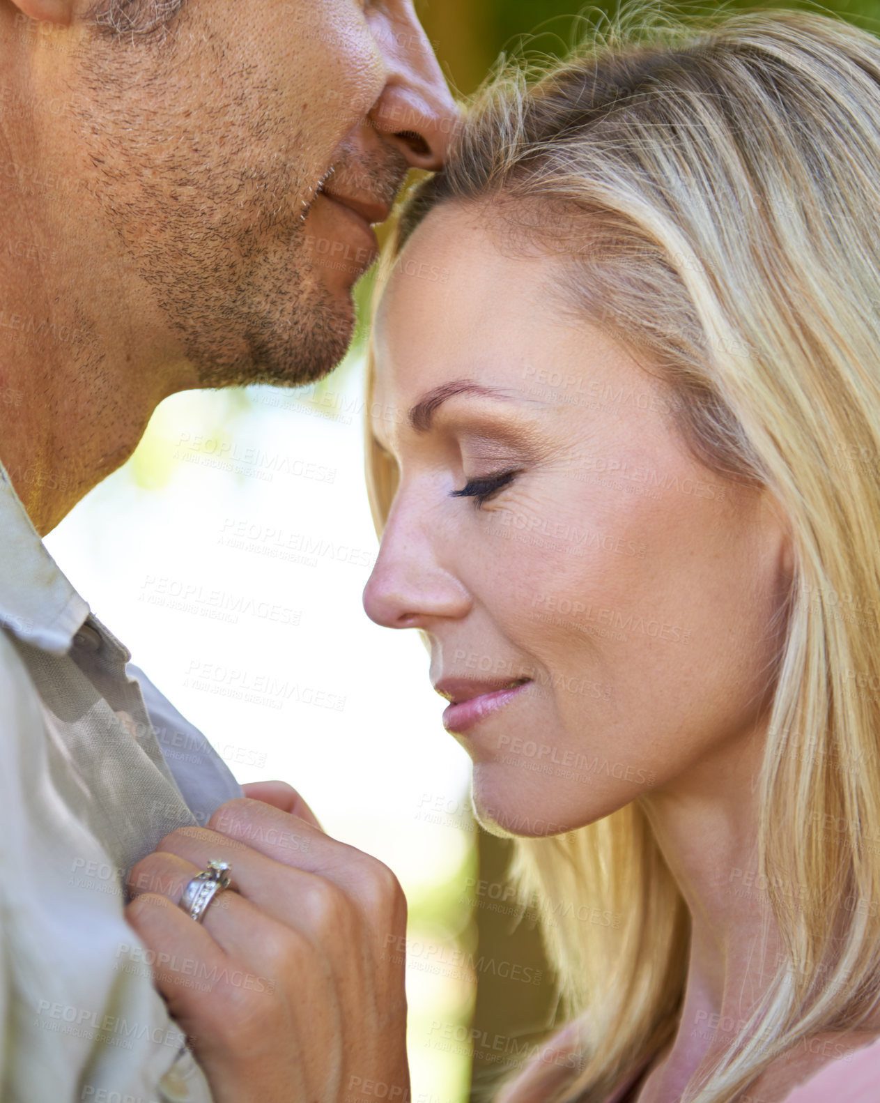 Buy stock photo Couple, hug and smile in nature with love on honeymoon date, bonding and anniversary vacation. Closeup, man and woman with happiness outdoor at park for relax, healthy relationship and summer holiday