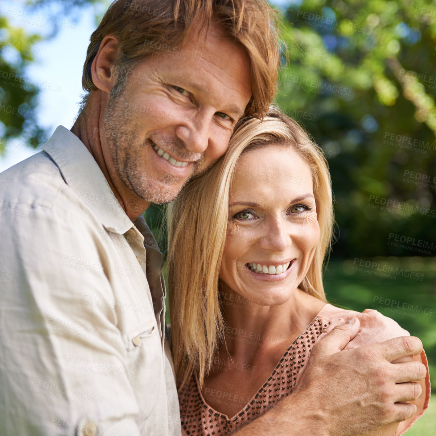 Buy stock photo Couple, portrait and hug in garden for romance, together and commitment in marriage or relationship. People, love and bonding on outdoor date in park, support and embrace on summer holiday