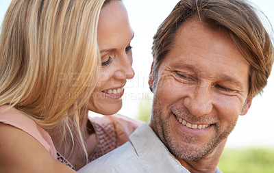 Buy stock photo Happy, hug and couple in park to relax together for bonding, relationship and love outdoors. Smile, marriage and closeup of man and woman embrace for romance, care and commitment on weekend in nature