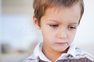 Buy stock photo Portrait of an unhappy little boy