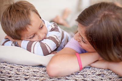 Buy stock photo Shot of two young siblings hanging out together
