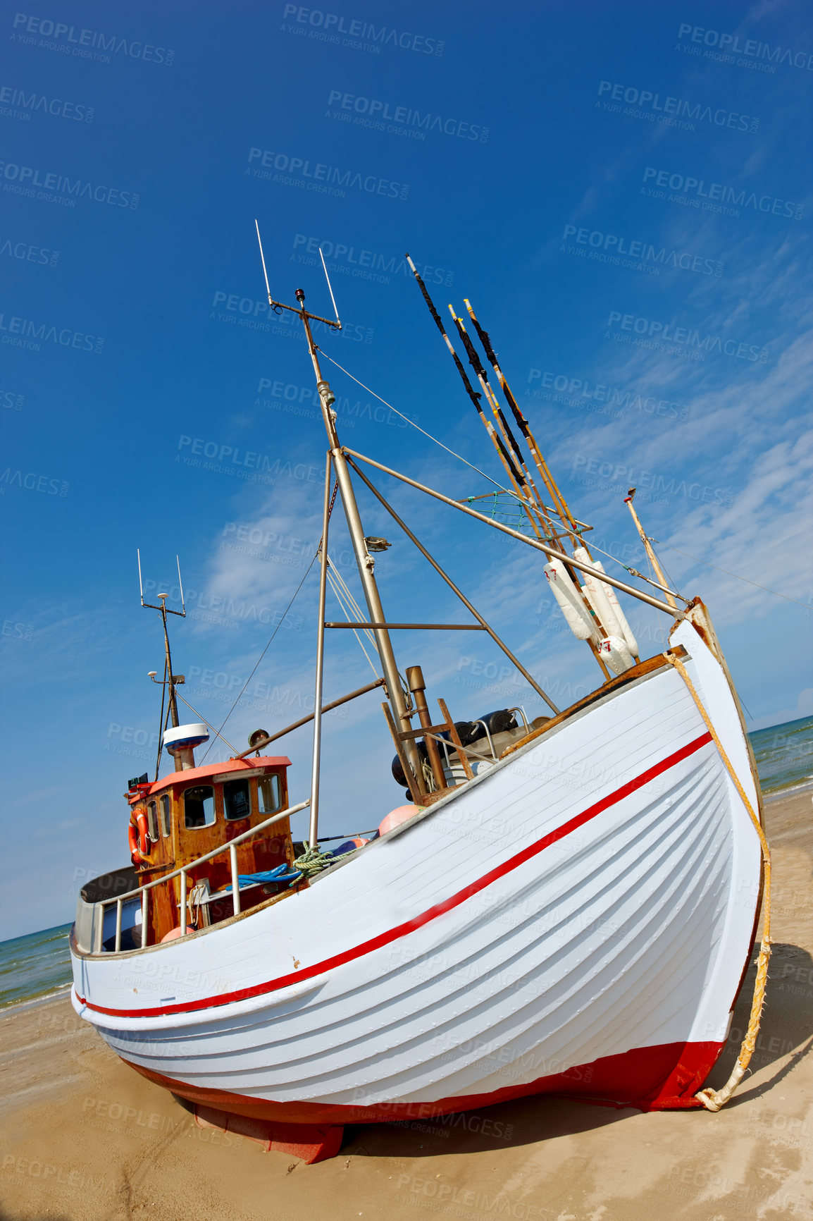 Buy stock photo A photo of a Danish fishing boat at the beach