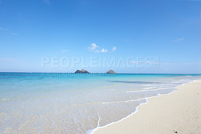 Buy stock photo Ocean, shore and blue sky for holiday, sand and rocks in Hawaii for peace and tranquility. Seaside, waves and summer for vacation, location and beach for clear water on travel and tropical trip 