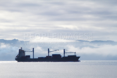 Buy stock photo Ship, sailing and travel at sea with cargo for transportation, international trade and logistics industry in the morning. Export, vessel and freight in ocean for journey, shipping business and sky