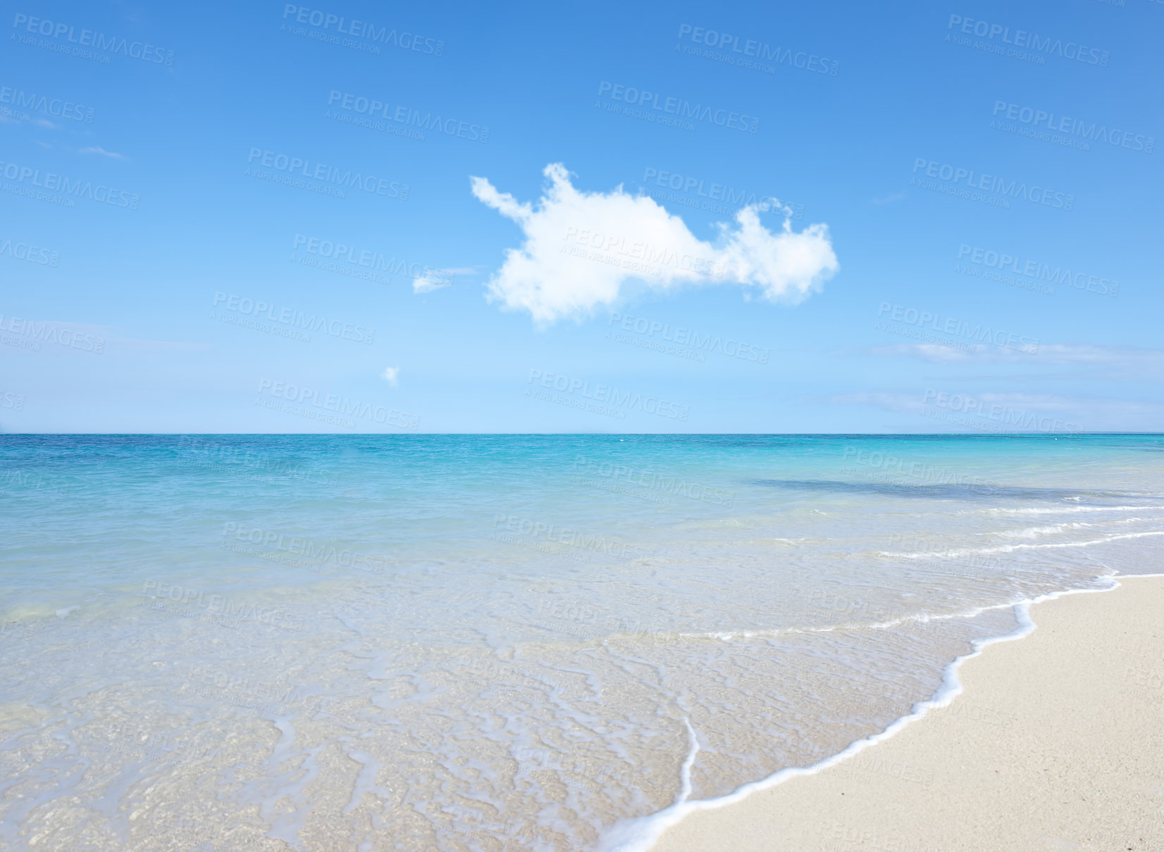 Buy stock photo Ocean, Bahamas and blue sky for holiday, sand and rocks in shore for peace and tranquility. Seaside, waves and summer for vacation, location and beach for clear water on travel and tropical trip 