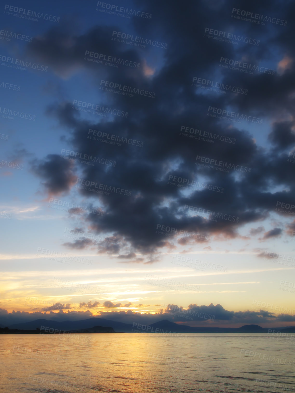 Buy stock photo Ocean, sunset and clouds in sky with mountains, water and seaside in evening. New Zealand, travel and destination for vacation in summer island, landscape and environment for holiday with nature