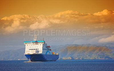 Buy stock photo Ship, ocean and mountain at sunset to travel with clouds, water and transportation for vacation sailing. Cruise, sky and sea with yacht for tourism, holiday and adventure with sunrise, trip or nature