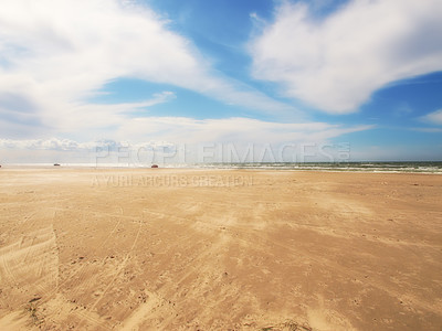 Buy stock photo Sand, beach and blue sky with clouds in nature for travel, vacation or holiday in Cape town. Landscape, ocean and water by seashore on tropical island for scenic outdoor summer weekend trip.