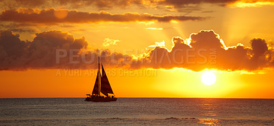 Buy stock photo Boat, beach and sunset with clouds, water and ocean with Waikiki, Honolulu and Hawaii. Dusk, seaside and nature with environment or travelling with vacation and adventure with journey, summer or ship