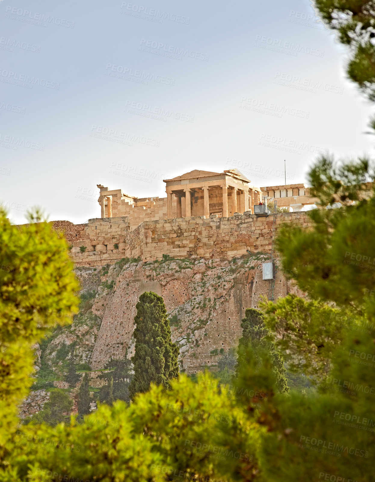 Buy stock photo Athens, location and holiday for trip, travel and outdoor in history landmark in Europe in summer. Medieval, outside and environment for scenic, bridge and stone monument in nature, tree and forest
