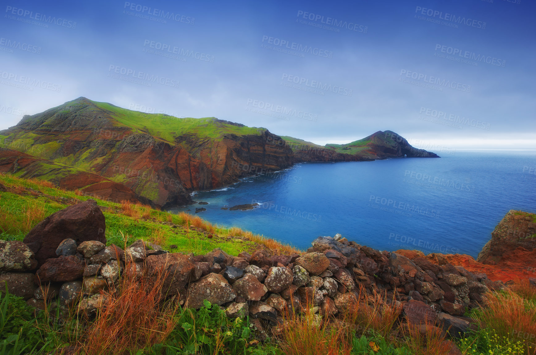 Buy stock photo Mountain, ocean and nature on island with blue sky, summer plants and natural landscape at travel location. Sea, cliff and sustainable environment with earth, rock and tropical holiday destination