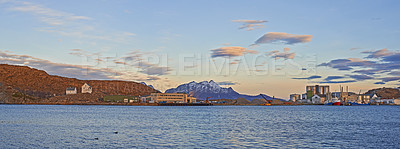 Buy stock photo Urban, sea and sky with clouds and mountains for harbor, landmark and destination for summer season. Bodoe, attraction or site for cityscape and travel on coast for scenic and vibrant getaway or view