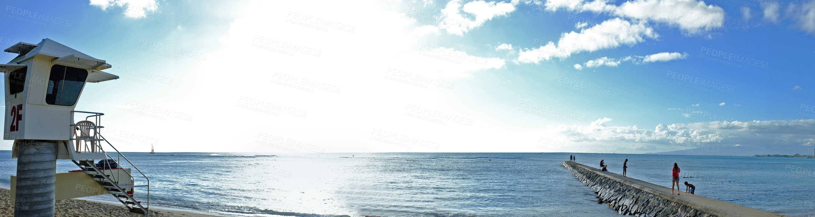 Buy stock photo Ocean, blue sky and people at beach for adventure, sunshine and travel on natural background or landscape. Sea, fresh air and clouds with calm water, vacation destination or location for tourism