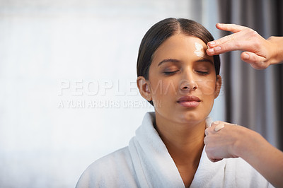 Buy stock photo Woman, hand or makeup artist to apply for beauty, skincare or cosmetology for health, facial or aesthetic. Cosmetic, cream and application for glow, flawless and dermatology treatment at luxury spa