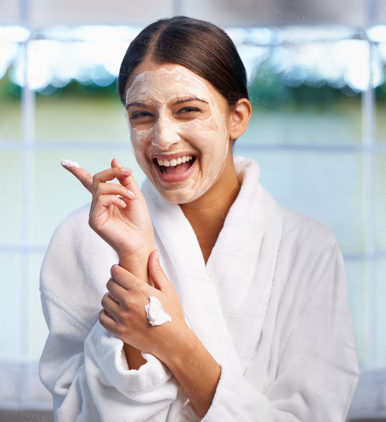 Buy stock photo Skincare, happy and woman with portrait, cream mask and beauty treatment at hotel spa with laugh. Robe, moisturizer and facial with wellness, dermatology and care with a smile and skin cosmetics