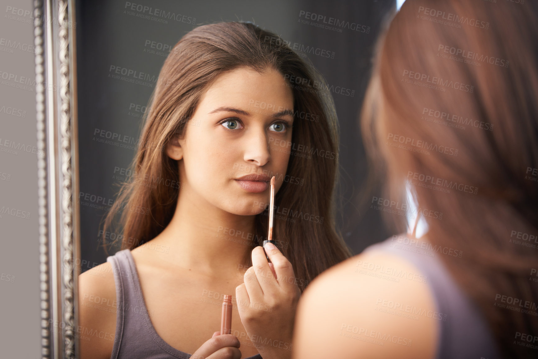 Buy stock photo Woman, thinking and lip gloss in mirror for makeup, application and getting ready for wellness in bedroom. Mouth, shine and thoughtful person with cosmetics, beauty product and self care in home