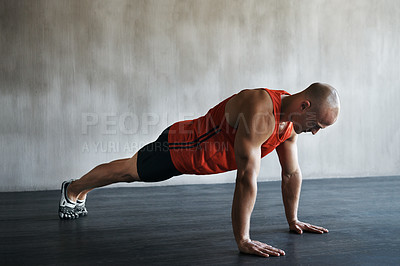 Buy stock photo Workout, muscular and man doing push up for exercise, health performance and sports training for muscle building. Bodybuilding mockup, healthy gym body and strong person doing studio floor pushup