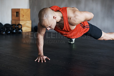 Buy stock photo Training, muscle endurance and strong man doing push up for healthy lifestyle, strength development or health club commitment. One arm pushup, motivation and male athlete workout, fitness or exercise