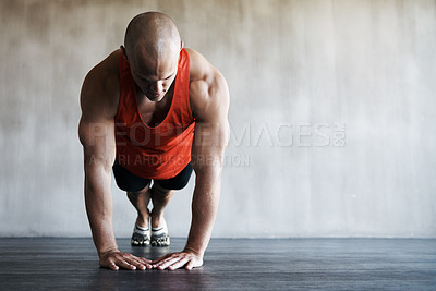 Buy stock photo Workout, gym and man in floor push up for exercise, health commitment or training for muscle growth. Fitness club mockup, healthy and body of strong person focus in athlete health challenge or pushup