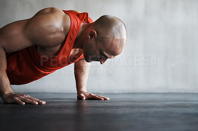 Buy stock photo Workout, endurance focus and man doing push up for strength exercise, gym commitment and muscle power endurance. Fitness mockup, motivation and person concentrate on training, exercising or practice