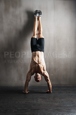 Buy stock photo Fitness body, wall and man doing handstand for muscle workout, balance focus or health club exercise. Gym training, hand stand and strong person, athlete or sportsman doing push up challenge 