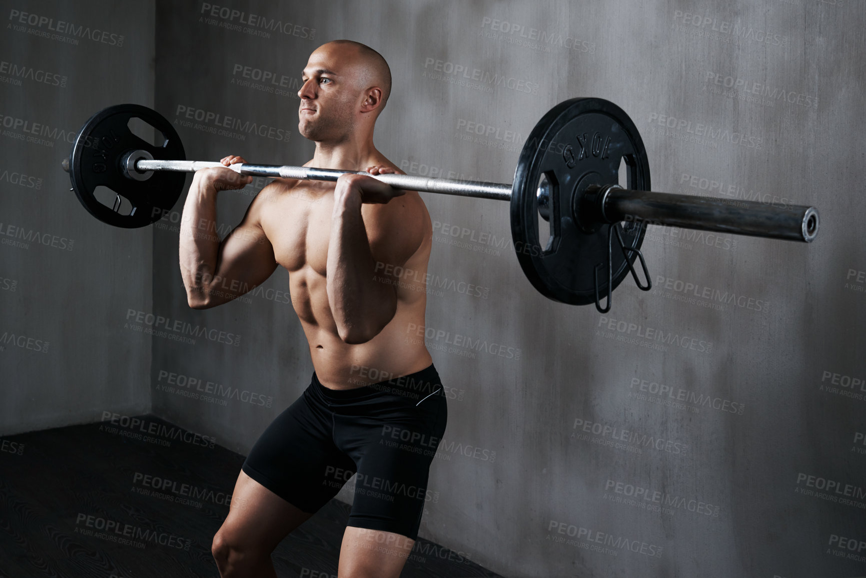 Buy stock photo Fitness, man and weightlifting with barbell for workout, exercise or training at the gym. Fit, active and strong muscular male lifting weight for intense strength exercising, power or bodybuilding