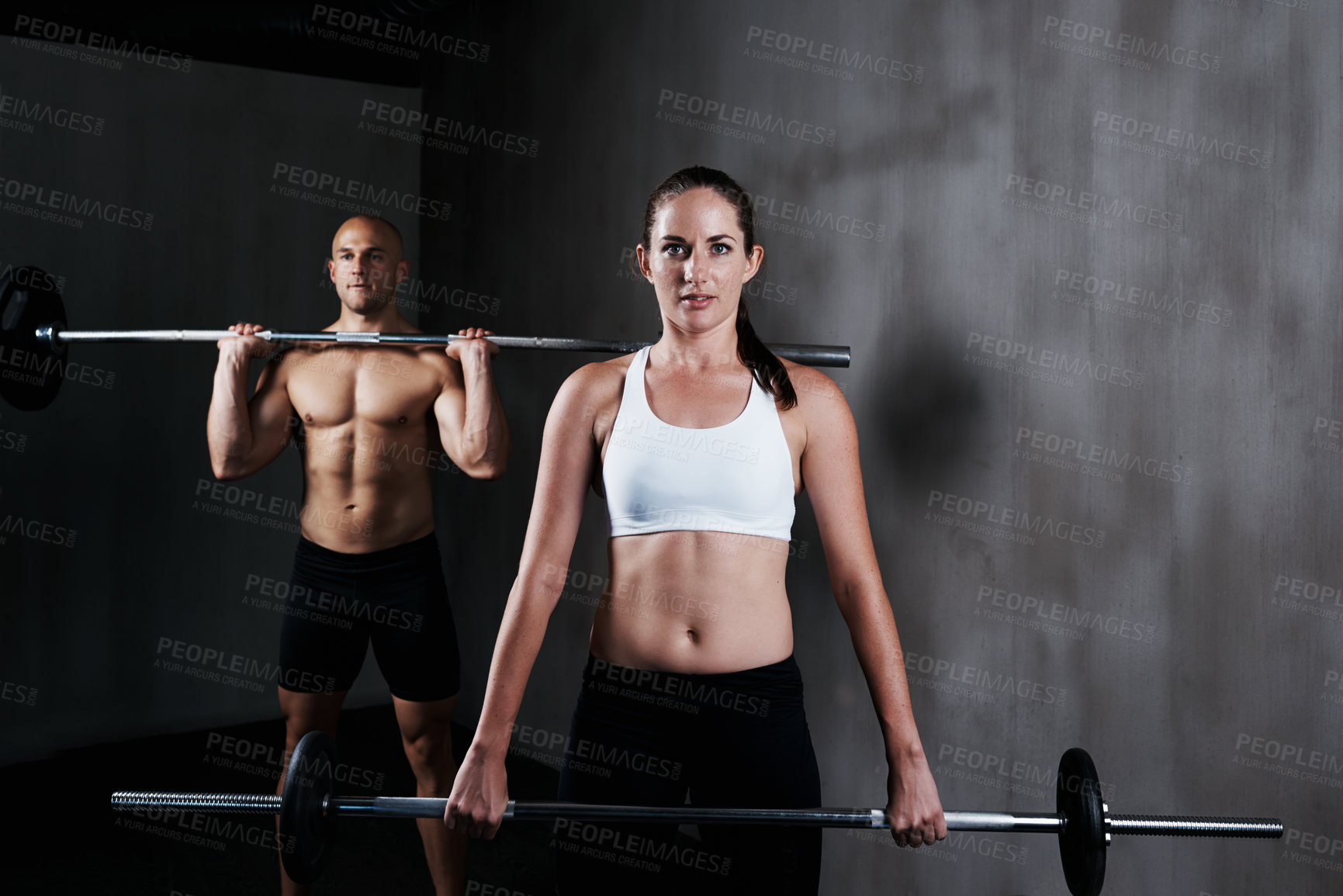 Buy stock photo Fitness, people and weightlifting with barbell for exercise, bodybuilding or workout at gym. Portrait of fit, active and strong woman and man lifting weight for intense strength, muscle or training