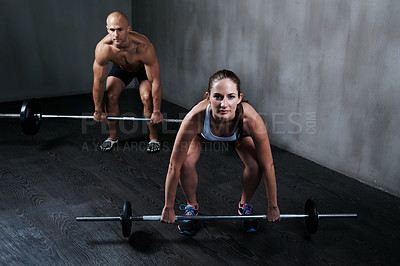 Buy stock photo Fitness, people and weightlifting with barbell for bodybuilding, workout or exercise at the gym. Fit, active and strong muscular man and woman lifting weight for intense strength, muscle or training
